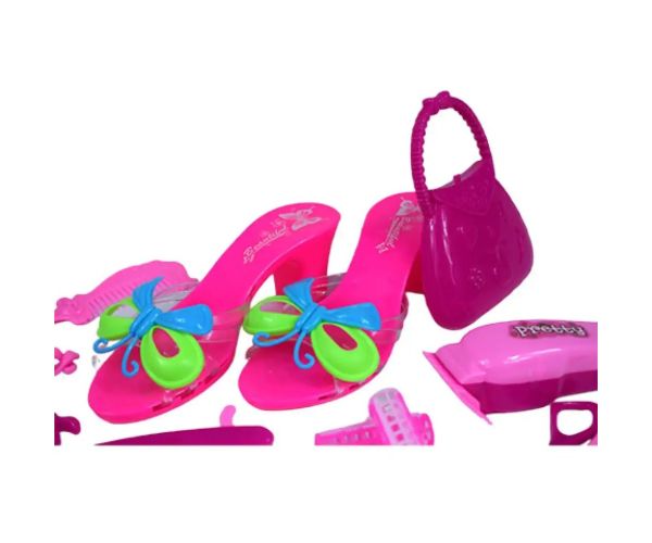 Set de frumusețe cu accesorii pentru coafor, pantofi și cercei într-o geantă